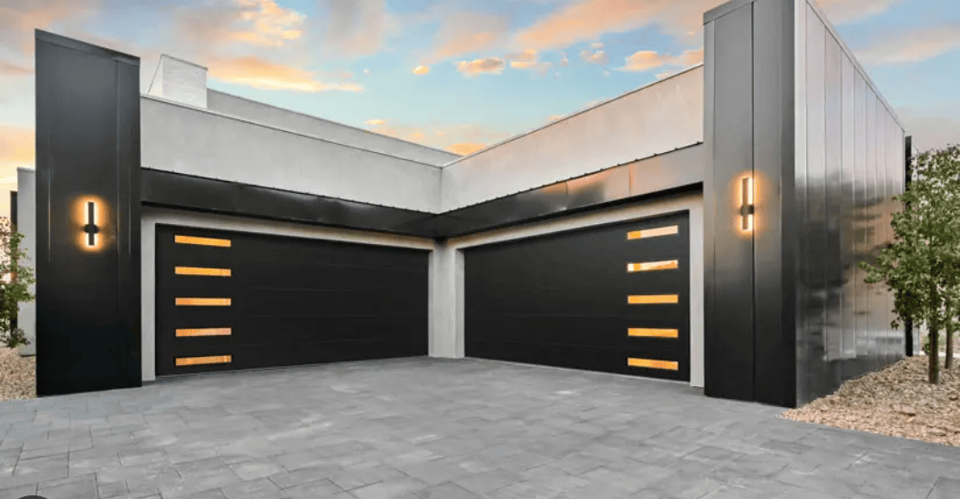 Two New 16x7 Garage Doors Installed By Strongman Garage Doors ensuring reliable and safe garage door operation for residential customers